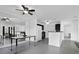 Open-concept dining area flowing into the kitchen, featuring modern flooring and lighting at 708 Mill Pond Se Dr, Smyrna, GA 30082
