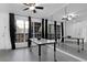 Bright dining area with modern floors, natural light, and ample space at 708 Mill Pond Se Dr, Smyrna, GA 30082