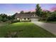 Beautiful house with manicured lawn, covered porch, and warm evening light creating a welcoming ambiance at 144 Bobs Sw Dr, Mableton, GA 30126