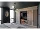 A modern bedroom with a built-in desk and entertainment center at 2870 Pharr Court South Nw # 2402, Atlanta, GA 30305