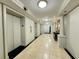 Elegant hallway featuring marble floors, elevator access, and tasteful decor at 2870 Pharr Court South Nw # 2402, Atlanta, GA 30305