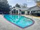 Inviting outdoor pool area with ample seating and a well-maintained pool at 2870 Pharr Court South Nw # 2402, Atlanta, GA 30305