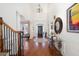 Spacious foyer with hardwood floors, decorative lighting, and elegant staircase at 359 Flatstone Sw Way, Marietta, GA 30064