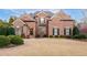 Brick two-story home with manicured landscaping and traditional architectural details at 359 Flatstone Sw Way, Marietta, GA 30064