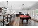 Entertain in this recreation room with pool table, wet bar, and entertainment area at 359 Flatstone Sw Way, Marietta, GA 30064