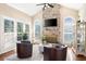 Bright living room with vaulted ceilings, stone fireplace, and hardwood floors at 359 Flatstone Sw Way, Marietta, GA 30064