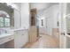 Spacious bathroom featuring dual sinks, large shower, and tile flooring at 359 Flatstone Sw Way, Marietta, GA 30064