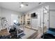 Functional home office with hardwood floors, built-in bookcase, and stylish decor at 359 Flatstone Sw Way, Marietta, GA 30064