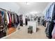 Spacious walk-in closet featuring ample shelving and hanging space at 359 Flatstone Sw Way, Marietta, GA 30064