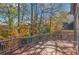Large deck with views of the trees and sky at 1139 Tennyson Ne Pl, Brookhaven, GA 30319