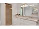 Bathroom features granite countertops, double sinks, and glass shower at 1139 Tennyson Ne Pl, Brookhaven, GA 30319