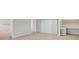 Bedroom area with built-in desk and shelving with a large closet at 1139 Tennyson Ne Pl, Brookhaven, GA 30319