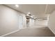 Spacious basement with carpeted floor, white walls, and recessed lighting, offering a versatile living space at 1276 Kingsview Se Cir, Smyrna, GA 30080