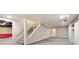 Finished basement with stairs, carpet, and access to additional rooms at 1276 Kingsview Se Cir, Smyrna, GA 30080