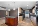 Well-lit kitchen with a center island and hardwood floors at 1276 Kingsview Se Cir, Smyrna, GA 30080