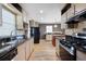 Spacious kitchen featuring stainless steel appliances and granite countertops at 1276 Kingsview Se Cir, Smyrna, GA 30080