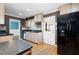 Kitchen with stainless steel appliances, granite countertops and hardwood flooring at 1276 Kingsview Se Cir, Smyrna, GA 30080