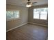 Inviting bedroom with ceiling fan, neutral paint, and good natural light at 147 Mildred Ct, Dallas, GA 30157