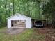 Detached garage with a black truck in front at 147 Mildred Ct, Dallas, GA 30157