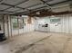 Garage interior view showcases concrete flooring, and windows for ample natural light at 147 Mildred Ct, Dallas, GA 30157