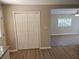 Hallway view highlighting the neutral walls and flooring throughout the house at 147 Mildred Ct, Dallas, GA 30157