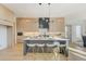 Stylish kitchen with a large island, modern light fixture, and seating, ideal for casual dining at 2551 Kilgore Rd, Buford, GA 30519