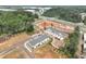 New construction townhome community in a suburban neighborhood with landscaping and convenient parking spaces at 121 Priestwood Ln, Acworth, GA 30102