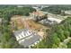 Aerial view of a newly developed townhome community near a greenbelt in a peaceful neighborhood at 121 Priestwood Ln, Acworth, GA 30102