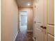 Hallway with carpet and white doors leading to rooms at 121 Priestwood Ln, Acworth, GA 30102