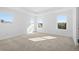 Bright bedroom with large windows allowing natural light and neutral carpet, creating a serene atmosphere at 3188 Eastham Run Dr, Dacula, GA 30019
