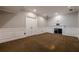 Finished basement featuring carpet flooring, a fireplace, and recessed lighting at 5825 Laurel Oak Dr, Suwanee, GA 30024