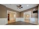 Bonus room with hardwood floors, ceiling fan, and plenty of open space at 5825 Laurel Oak Dr, Suwanee, GA 30024