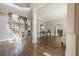Grand foyer entrance with hardwood floors, decorative pillars, and curved staircase at 5825 Laurel Oak Dr, Suwanee, GA 30024