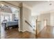 Upstairs hallway with hardwood floors leading to the main bedroom at 5825 Laurel Oak Dr, Suwanee, GA 30024
