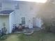 View of the backyard with a small concrete patio at 8538 Westchester Dr, Douglasville, GA 30134