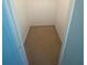 A walk-in closet with neutral walls and carpet at 8538 Westchester Dr, Douglasville, GA 30134