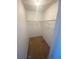 Walk-in closet with wire shelving for ample storage at 8538 Westchester Dr, Douglasville, GA 30134