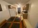 This eat-in kitchen offers dark cabinetry, white appliances and a dining table at 8538 Westchester Dr, Douglasville, GA 30134