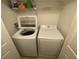 A laundry room with a washer and dryer at 8538 Westchester Dr, Douglasville, GA 30134