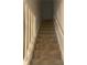 Carpeted staircase leading to upper level with white railing offers a traditional design at 8538 Westchester Dr, Douglasville, GA 30134