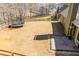 Aerial view of the backyard featuring a brick patio and a large play area at 95 Gorham Gates Dr, Hiram, GA 30141