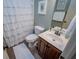 Charming bathroom with a single vanity, a toilet, and a shower with a decorative curtain at 95 Gorham Gates Dr, Hiram, GA 30141