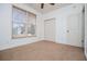 Carpeted bedroom with closet, window, and neutral walls at 95 Gorham Gates Dr, Hiram, GA 30141