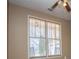 Cozy bedroom featuring natural light from two windows, complemented by neutral wall color at 95 Gorham Gates Dr, Hiram, GA 30141