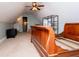 Attic bedroom featuring sloped ceilings, carpet flooring and a ceiling fan at 95 Gorham Gates Dr, Hiram, GA 30141