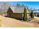 View of home's exterior showcasing the well-manicured landscaping and charming architectural details at 95 Gorham Gates Dr, Hiram, GA 30141