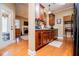 Open-concept kitchen with hardwood flooring and lots of counter space at 95 Gorham Gates Dr, Hiram, GA 30141