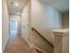 Upstairs hallway with neutral walls, carpet flooring, and closet at 109 Priestwood Ln, Acworth, GA 30102