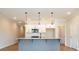 Kitchen island with granite countertops, a black faucet, and pendant lighting at 109 Priestwood Ln, Acworth, GA 30102