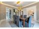 Dining room with modern chandelier, marble floors and open views of the office and hallway at 3968 Ashford Dunwoody, Brookhaven, GA 30319